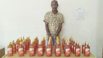 বড়লেখায় ৫০ বোতল ভারতীয় মদসহ গ্রেপ্তার ১